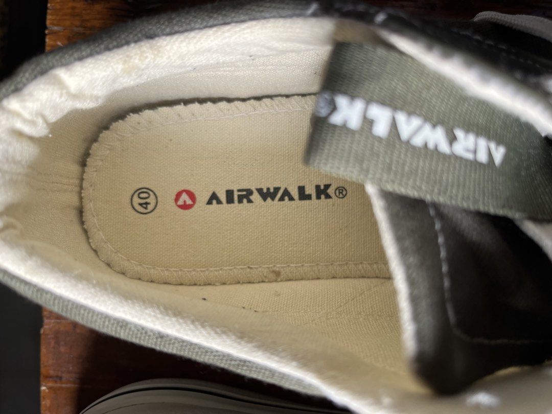 Airwalk Green Canvas Sneakers Size 40 (Category: Sneakers) located in Amadeo. Submitted by momdistrict18 (Listing ID 1470413965, Image 2). Description: - Brand: Airwalk - Color: Green canvas with white details - Size: 40 (printed on insole) - Features: White rubber toe caps, chunky soles, contrasting stitching - Inclusions: Comes with white laces - Condition: Great casual everyday shoes for your rotation.