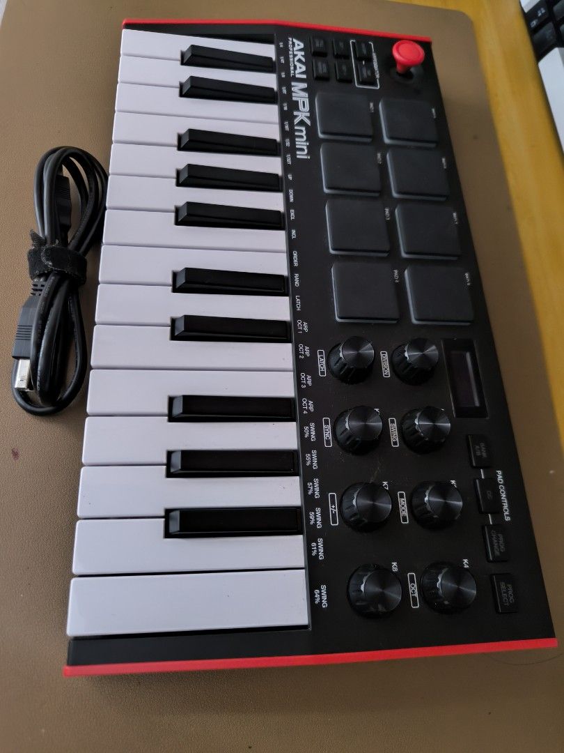 Akai MPK Mini MK3 MIDI Keyboard Controller (Category: Musical Instruments) located in Caloocan City. Submitted by crayyyyy (Listing ID 1470426176, Image 1). Description: Selling my Akai MPK Mini MK3 MIDI Keyboard Controller. ✅ Compact and portable ✅ Great for music production, beat-making, and home studio setups ✅ Includes USB cable ✅ Keyboard keys, drum pads, and control knobs Ideal for beginners, aspiring music producers, and anyone looking for
