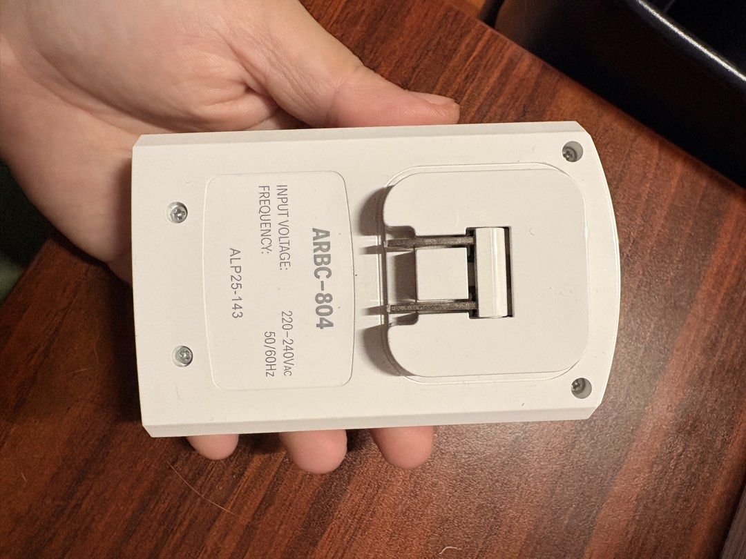 Akari ARBC-804 Battery Charger (Category: Batteries & Chargers) located in Manila. Submitted by karellevic16181 (Listing ID 1470464741, Image 2). Description: - Model: Akari ARBC-804 Battery Charger - Charges up to 4 rechargeable batteries simultaneously (AAA or AA) - Built-in foldable plug for direct wall socket connection - Input: 220-240VAC, 50/60Hz - Individual red LED indicator lights per charging slot - Clean white plastic housing - 100% wo