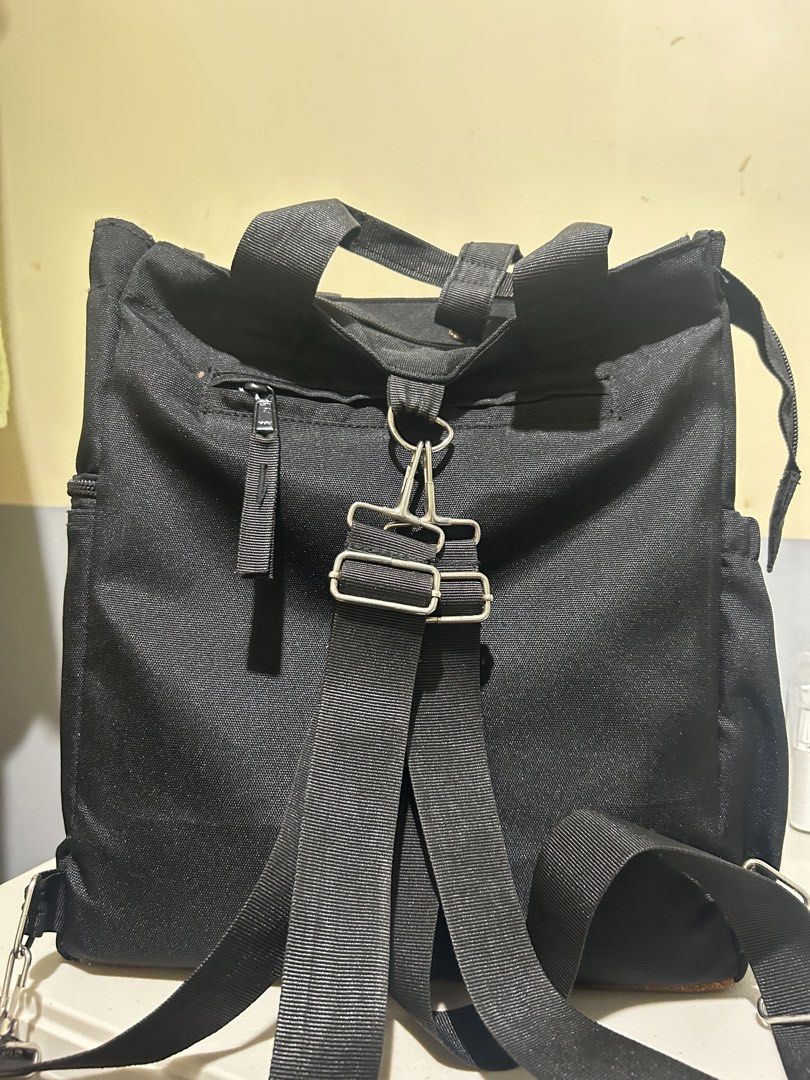 Akbay Black Bag (Category: Backpacks) located in Caloocan City. Submitted by g4bbygabby (Listing ID 1470487989, Image 3). Description: - Brand: Akbay - Color: Classic Black - Material: Durable heavy-duty canvas - Straps: Dual top carry handles & adjustable clip-on shoulder straps - Pockets: Front zippered pocket with fabric pull tab + internal divider and side pockets - Ideal for: Everyday use, school, or work -Tutuklap lang ng unti yung bakal na