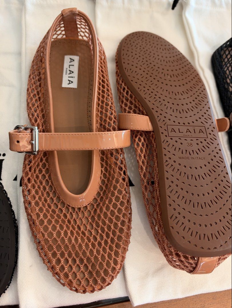 Alaïa Fishnet Mary Jane Flats Size 38 (Category: Flats & Sandals) located in Manila. Submitted by mypreloved2024 (Listing ID 1470529643, Image 2). Description: - Brand: Alaïa - Style: Iconic fishnet Mary Jane flats - Size: 38 (Made in Italy) - Available Colors: Black crystal, black, brown, and taupe (Selling individually, message to choose) - Design: Mesh upper with adjustable instep buckle strap - Sole: Flat sole with patterned rubber outsole - 