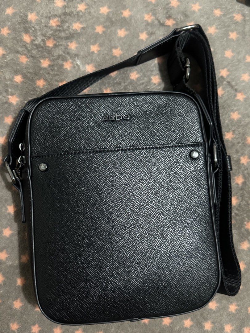 ALDO Black Crossbody Bag (Category: Cross-body Bags) located in Quezon City. Submitted by jojo_0402 (Listing ID 1470506215, Image 1). Description: Selling my Aldo Unisex Sling Bag. Like new and well maintained. No flaws or issues. Original, purchased in the US.