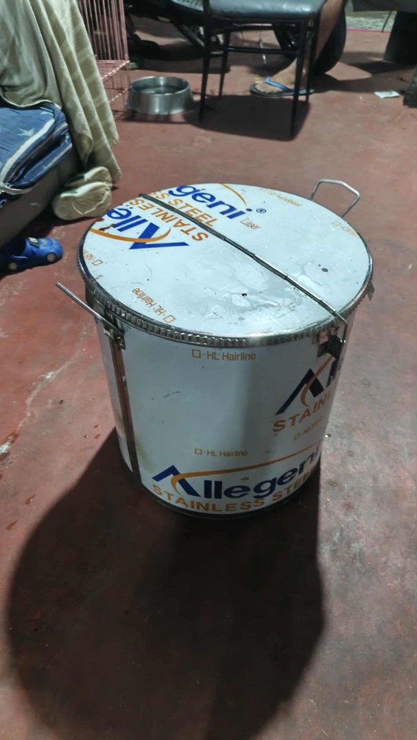 Allegeni Stainless Steel Compartment Container Drum (Category: Food Organization & Storage) located in Manila. Submitted by wisegem-231b (Listing ID 1470400364, Image 3). Description: - Brand: Allegeni - Material: Heavy-duty stainless steel - Design: Industrial food prep style with divided internal compartments - Features: Secure locking lid mechanism and sturdy side handles - Condition: Brand new with protective plastic film still attached to ex