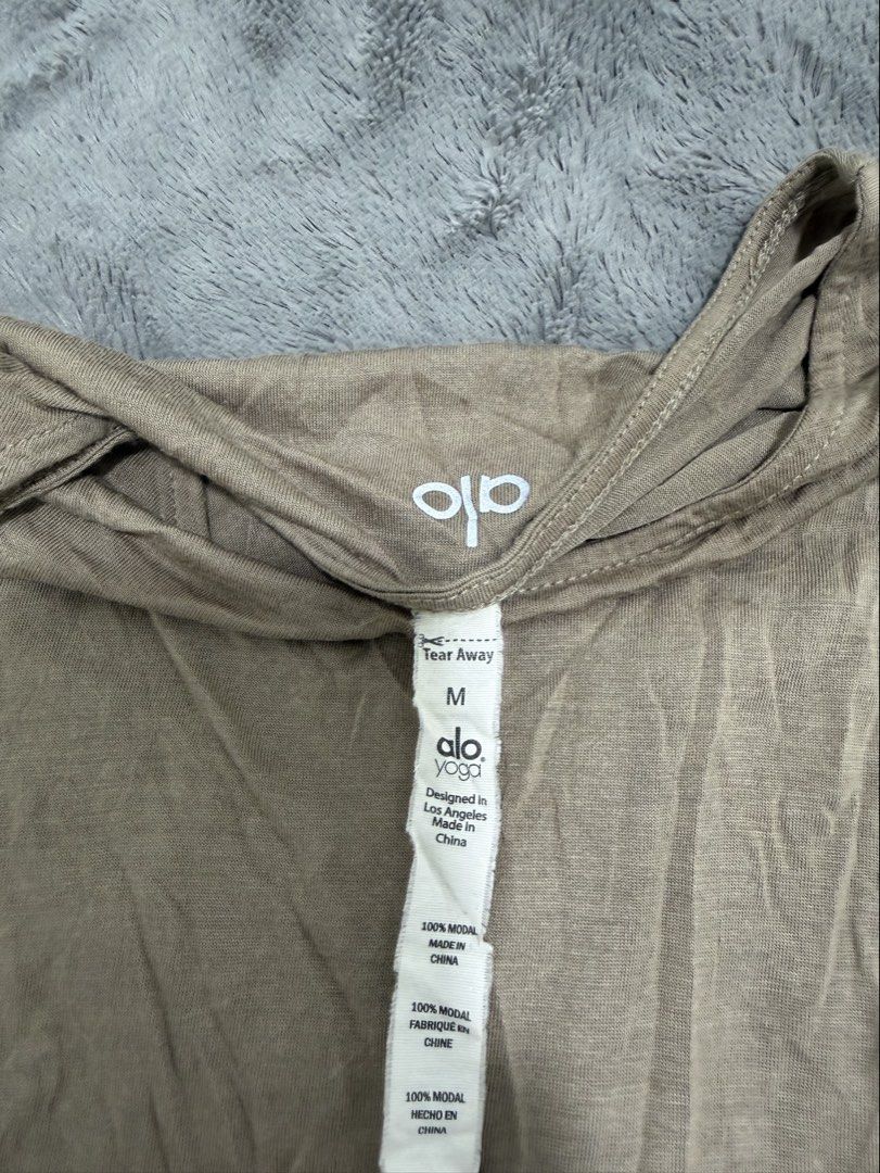 Alo Yoga Lace Up Top (Category: Activewear) located in Dasmarinas. Submitted by shoppingaccount__ (Listing ID 1470458761, Image 3). Description: medium on tag.