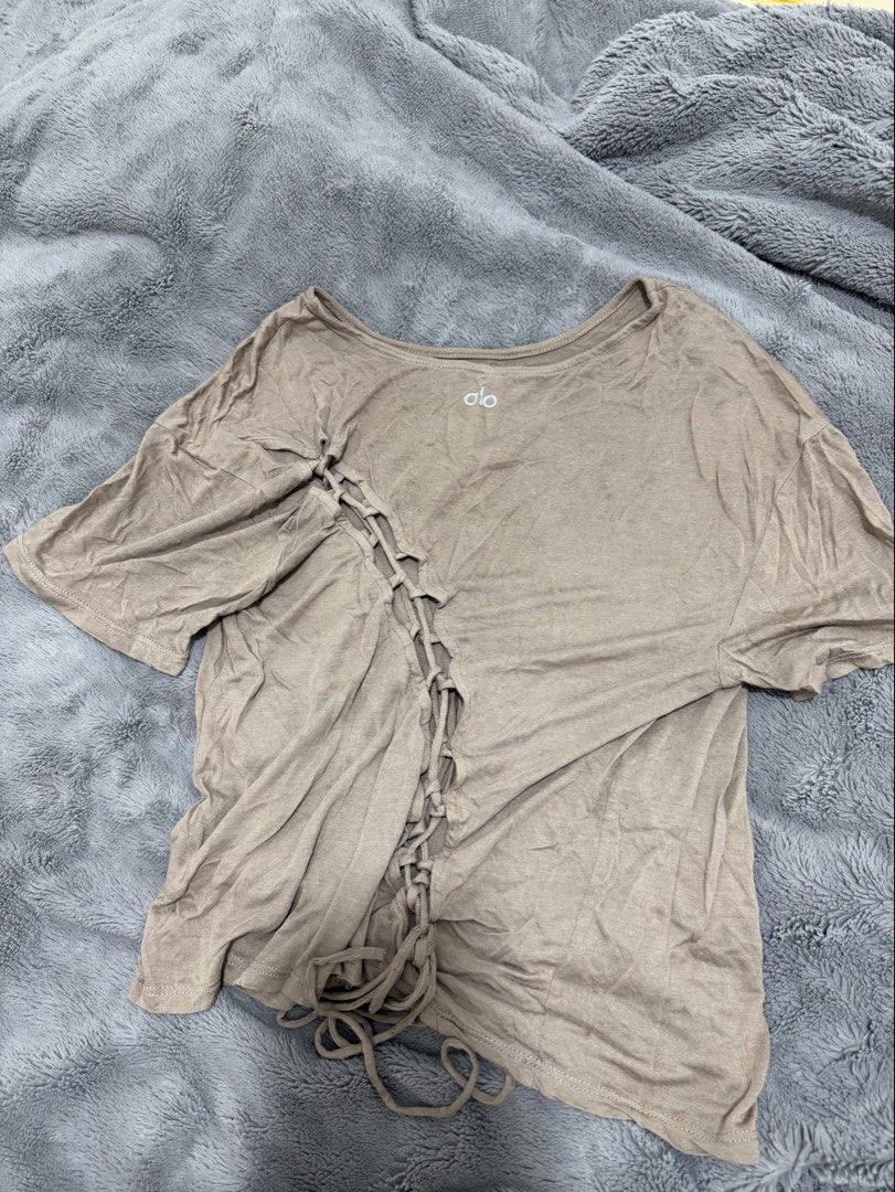 Alo Yoga Lace Up Top (Category: Activewear) located in Dasmarinas. Submitted by shoppingaccount__ (Listing ID 1470458761, Image 1). Description: medium on tag.