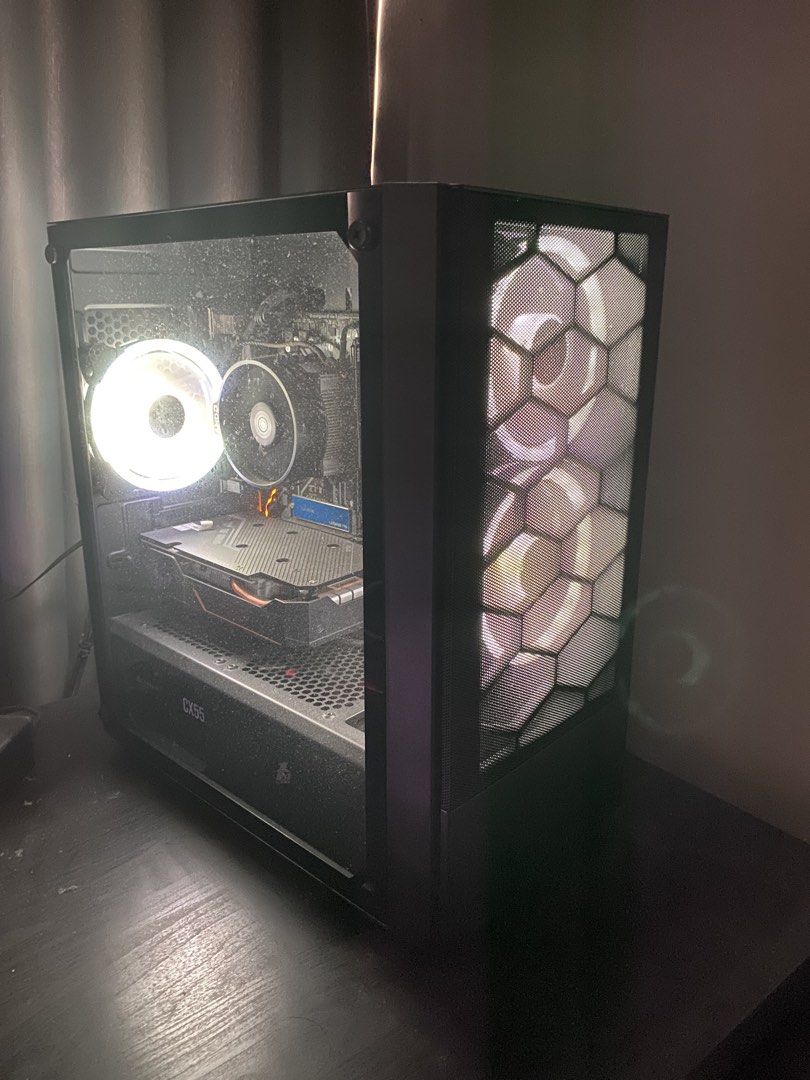 AMD Ryzen 5 GTX 1650 Gaming PC (Unit only) (Category: Desktops) located in Lipa City. Submitted by enriquedslva (Listing ID 1470377224, Image 2). Description: Negotiable! RUSH Selling gaming desktop pc: MOBO: Gigabyte B450M DS3H processor: Ryzen 5 3400G GPU: TUF GAMING GTX 1650 (4GB Vram) Memory: Kingston Fury DDR4 8GB (x2) PSU: Corsair CX 550 ATX power supply 80 plus bronze Storage: Adata Legend 710 Sata ssd (237GB - OS) Hitachi HDD (465 GB) Ram