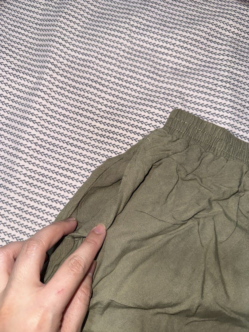 American Eagle Olive Green Ruffle Shorts XS (Category: Shorts) located in Santa Ana. Submitted by fatikilla (Listing ID 1470378417, Image 3). Description: - Brand: American Eagle - Size: XS - Color: Olive Green - Material: Super soft and comfortable fabric - Waistband: Elastic with a functional drawstring for easy pull-on style - Details: Cute ruffle hem at the bottom - Pockets: Convenient deep side pockets - Condition: Excellent/Great for casual