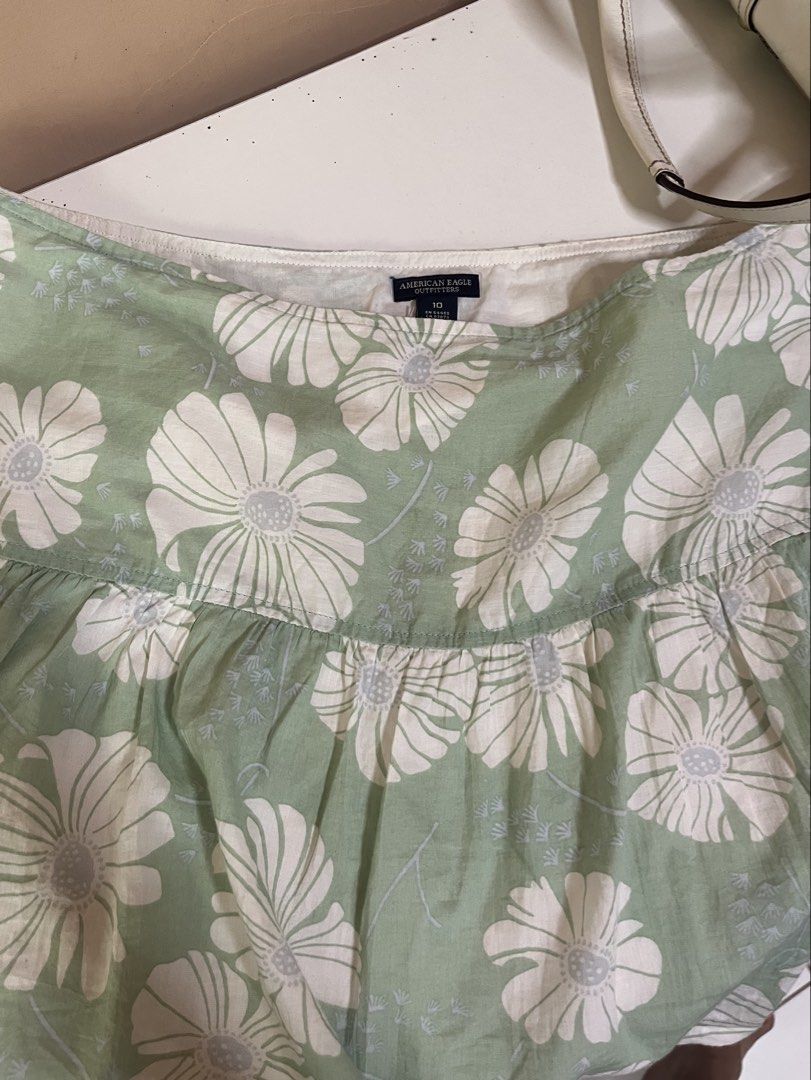 American Eagle Summer skirt Daisy (Category: Skirts) located in Dagupan City. Submitted by whimsyluns (Listing ID 1470398247, Image 3). Description: Summer Daisy Skirt 🌱🪷 size: w:32inch length: 14inch 💘no flaw 💘100%cotton 💘double lining/ not see through 💘perfect for beach trip 💘super nice in person ‼️color may vary due to lighting ‼️ .
