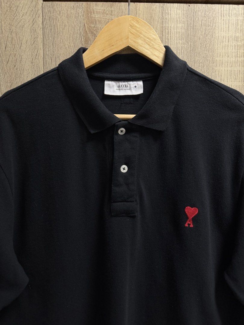 Ami Paris Polo Shirt (Category: Tshirts & Polo Shirts ) located in Cavite. Submitted by PRIVATE.Selection (Listing ID 1470391596, Image 3). Description: Ami Paris Polo Shirt Size Large W- 22 L- 29 Good as new no issues .