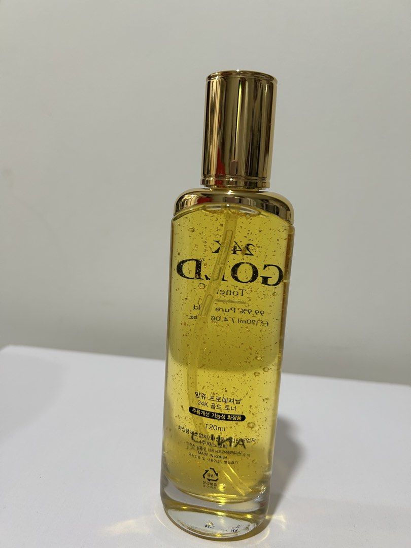 ANJO Professional 24K Gold Toner (Category: Face Care) located in Rizal. Submitted by CMaeCAme (Listing ID 1470466812, Image 2). Description: a Korean skincare toner infused with 99.9% pure gold flakes..