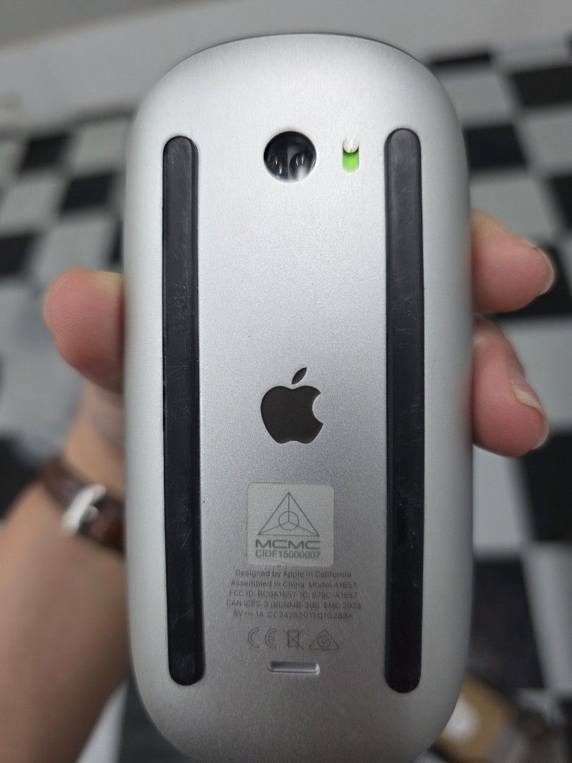 Apple Magic Mouse Black/ Silver (Category: Mouse & Mousepads) located in Cavite. Submitted by daintybabeph (Listing ID 1470388801, Image 3). Description: Apple Magic Mouse Color: Black and Silver Designed by Apple in California, Assembled in China Inclusion: Mouse only (hindi na nagagamit).