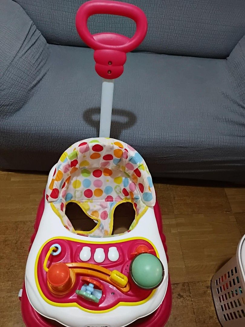 Apruva Baby Walker (Category: Infant Playtime) located in Taguig. Submitted by javinmonkiel (Listing ID 1470391692, Image 3). Description: Selling an Apruva baby walker in white and pink with a cute polka dot seat. Features a parent push handle, fun activity tray with toys, and smooth wheels. Removable seat pad for easy cleaning. Still in very good condition! Less than 1 year of use Clean and well-maintained Sounds still working! RFS: No longer u