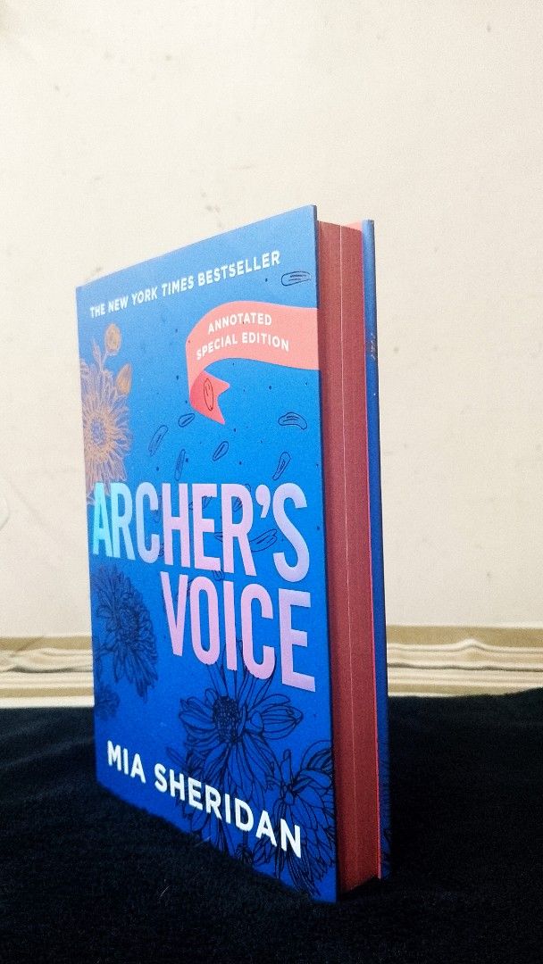 Archer's Voice Annotated Special Edition Mia Sheridan (Category: Storybooks) located in Caloocan City. Submitted by cxrpse01 (Listing ID 1470518692, Image 2). Description: - Title & Author: Archer's Voice by Mia Sheridan - Edition: Annotated Special Edition (New York Times bestseller) - Condition: Brand new, unread, and clean pages - Design: Stunning blue cover with floral artwork, pink ribbon graphic, and eye-catching red sprayed edges - Perfect