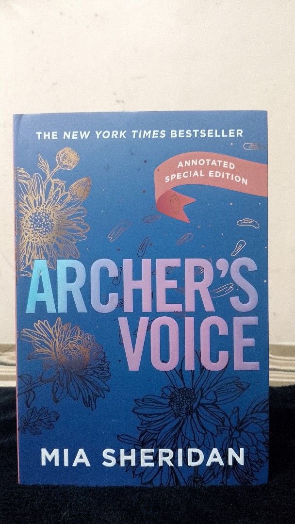Archer's Voice Annotated Special Edition Mia Sheridan (Category: Storybooks) located in Caloocan City. Submitted by cxrpse01 (Listing ID 1470518692, Image 1). Description: - Title & Author: Archer's Voice by Mia Sheridan - Edition: Annotated Special Edition (New York Times bestseller) - Condition: Brand new, unread, and clean pages - Design: Stunning blue cover with floral artwork, pink ribbon graphic, and eye-catching red sprayed edges - Perfect