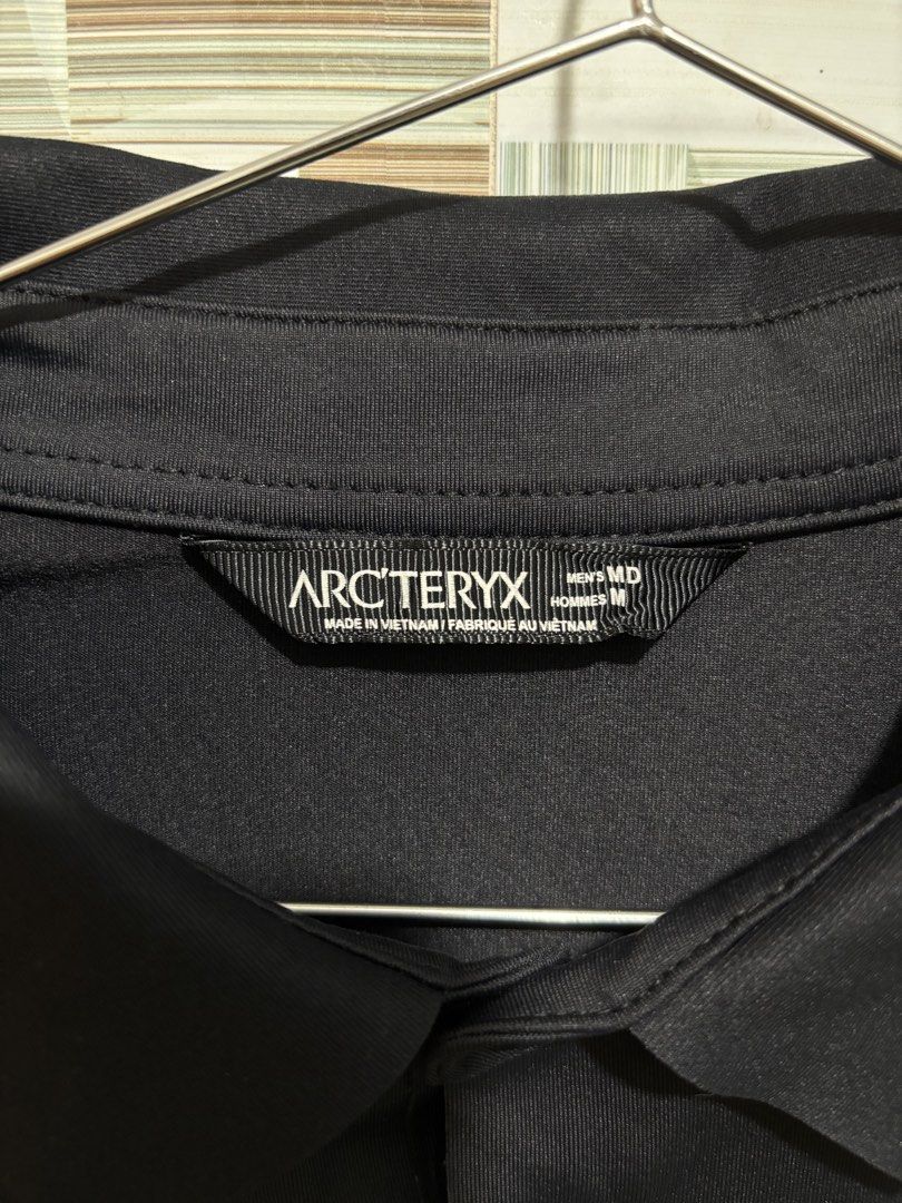 Arc'teryx Long Sleeve Polo Shirt (Category: Tshirts & Polo Shirts ) located in Caloocan City. Submitted by nlubon (Listing ID 1470459450, Image 3). Description: - Brand: Arc'teryx - Item: Long Sleeve Polo Shirt - Color: Black - Size: Men's Medium (Regular Fit) - Material: Lightweight technical fabric - Details: 3-button collar, embroidered logo on left chest - Origin: Made in Vietnam - Condition: Clean inside and out, tags intact.