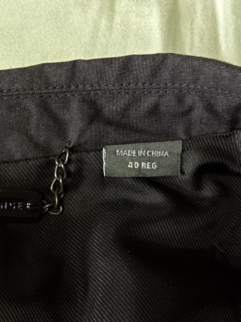 Armani Exchange Black Blazer Size 40 Reg (Category: Coats, Jackets and Outerwear) located in Manila. Submitted by seangoart (Listing ID 1470359423, Image 2). Description: - Brand: Armani Exchange - Size: 40 Regular - Color: Classic Black - Style: Two-button closure with notched lapels and sleek pocket details - Lining: Body (Nylon/Acetate), Sleeves (100% Acetate) - Care: Dry clean only - Condition: Excellent/Worn with care - Perfect for: Formal e