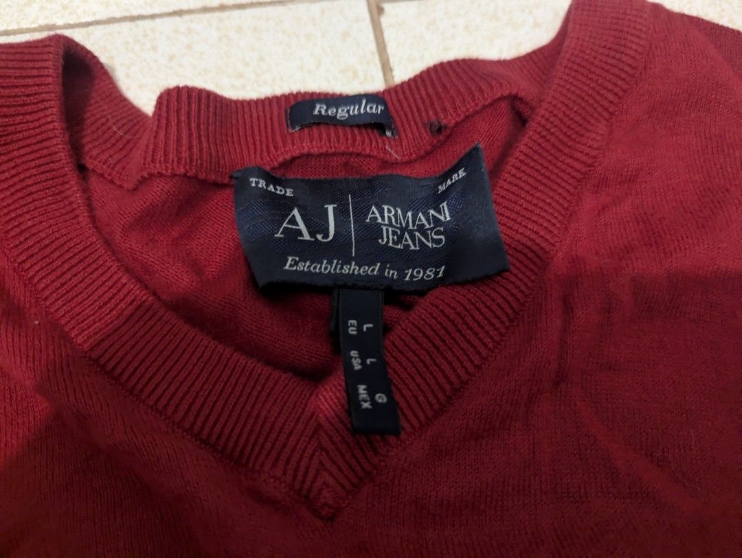 Armani Jeans Red Long Sleeve (Category: Tshirts & Polo Shirts ) located in Manila. Submitted by _neku (Listing ID 1470456205, Image 2). Description: 28x19.5 with issue, repaired pinhole see last pic.
