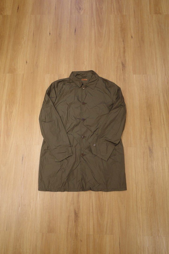 Aspesi Limone Rain Coat (Dark Green) (Category: Coats, Jackets and Outerwear) located in Pasig City. Submitted by rinse___repeat (Listing ID 1470402268, Image 1). Description: Aspesi Limone Rain Coat (Dark Green) Nylon taffeta raincoat detailed with pointy collar, button fastening, two front welt pockets with concealed button, an inner zip pocket and a patch one, adjustable cuffs and rear central vent. Size 2XL Pit to pit 24.5” / Length 35.75” Ba