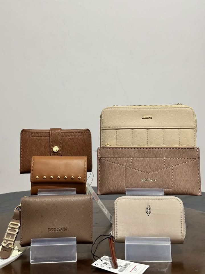 Assorted Branded Wallets and Pouches Collection (Category: Wallets & Card holders) located in Arayat. Submitted by eyynythingfinds (Listing ID 1470472744, Image 3). Description: - Authentic branded wallets & pouches (Coach, Nine West, Steve Madden, Secosana) - Available styles: Cardholders, zip-arounds, and clasp purses - Colors: Black, pink, brown, and blue - Condition: Brand new with original tags attached (selected items) - Perfect for daily u