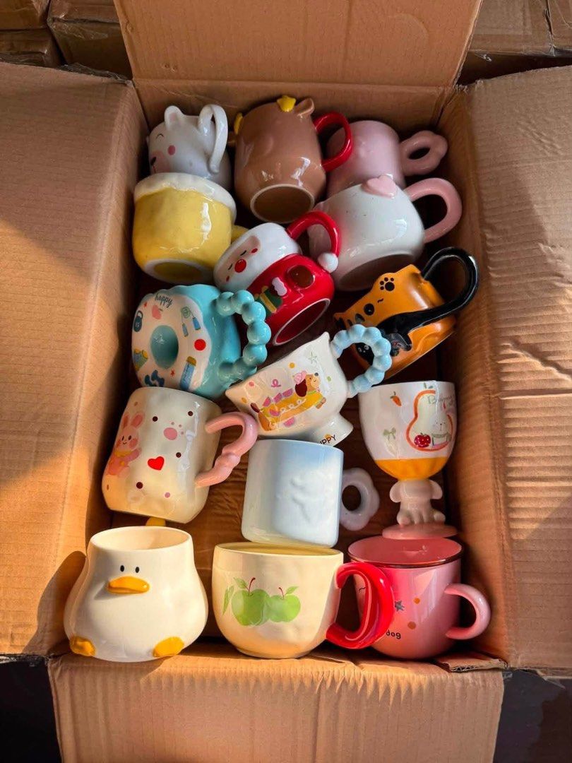 Assorted Cute Ceramic Mugs Cartoon Animals and Fruit Designs (Category: Coffee & Tea Tableware) located in Cavite. Submitted by merielleceniza12 (Listing ID 1470404744, Image 1). Description: 📌4200 for 60pcs cute mugs💕 - Condition: Brand new, unused, straight from the box - Variety: Assorted ceramic mugs with fun designs (cartoon animals, ducks, cats, apples, flowers) - Usage: Perfect for morning coffee, tea, or as a gift - Purchase Options: Bu