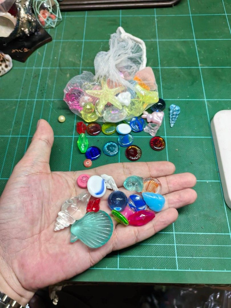 Assorted Decorative Glass (Category: Other Home Decor) located in Cebu City. Submitted by dudes_villanueva (Listing ID 1470383822, Image 1). Description: Assorted Decorative Glass & Acrylic Beads / Ocean Charms Lot Excellent condition.