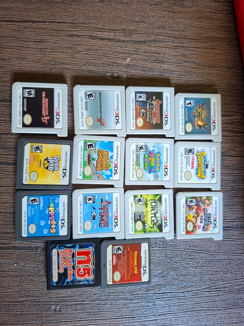 Assorted Nintendo 3DS and DS Game Cartridges (Category: Nintendo) located in Antipolo. Submitted by cheche2111 (Listing ID 1470370689, Image 1). Description: - Tested and 100% working game bundle - Includes Nintendo 3DS and DS titles like Super Smash Bros, Pokémon Rumble World, Animal Crossing New Leaf, Mario Kart 7, Adventure Time, and Monster Hunter 4 Ultimate - Includes a bonus flashcart - Cartridges only (no original cases) - Great value bund
