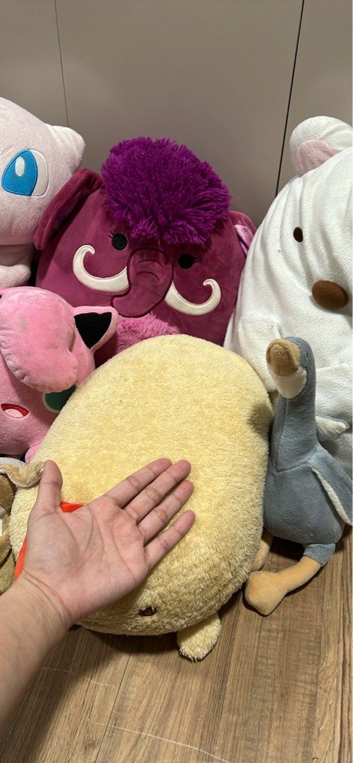 Assorted Pokemon and Character Plush Toys (Category: Plushies & Soft Toys) located in Quezon City. Submitted by prelovedbymissar (Listing ID 1470545774, Image 2). Description: - Mixed plush toy bundle in various sizes, textures, and colors - Features popular Pokémon characters like Mew and Jigglypuff - Includes a large white bear, giant yellow chick with red wings, woolly mammoth, reindeer, and grey bunny - Great addition for kids, collectors, or