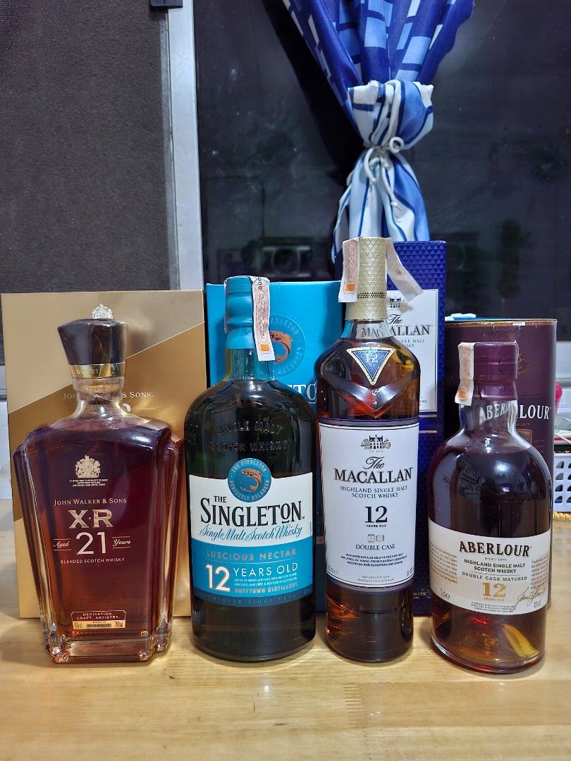 Assorted Whisky Collection Johnnie Walker Macallan Aberlour Singleton (Category: Beverages) located in Las Pinas. Submitted by Pourdecisionsliquor1996 (Listing ID 1470492170, Image 1). Description: - Collection of 4 premium whisky bottles - Included: Johnnie Walker XR 21 Years, The Macallan 12 Double Cask, The Singleton 12 Years Old, Aberlour 12 Highland Single Malt - Seals intact and original boxes included for every bottle - Carefully kept in p