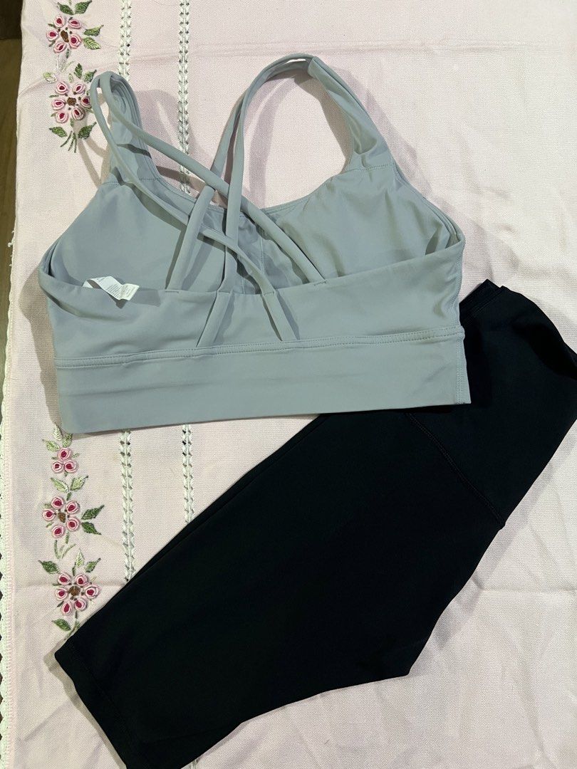 Athletic Crop Top and Biker Shorts Set (Category: Activewear) located in Marikina City. Submitted by tintinarenas (Listing ID 1470461198, Image 2). Description: - 2-piece matching activewear set - Crop top: Light grey-blue, Size L, featuring stylish crisscross back straps - Biker shorts: Classic black, Size M - Material: 80% nylon, 20% spandex for a soft, stretchy, and comfortable fit - Versatile: Great for workouts, yoga, or running daily errand