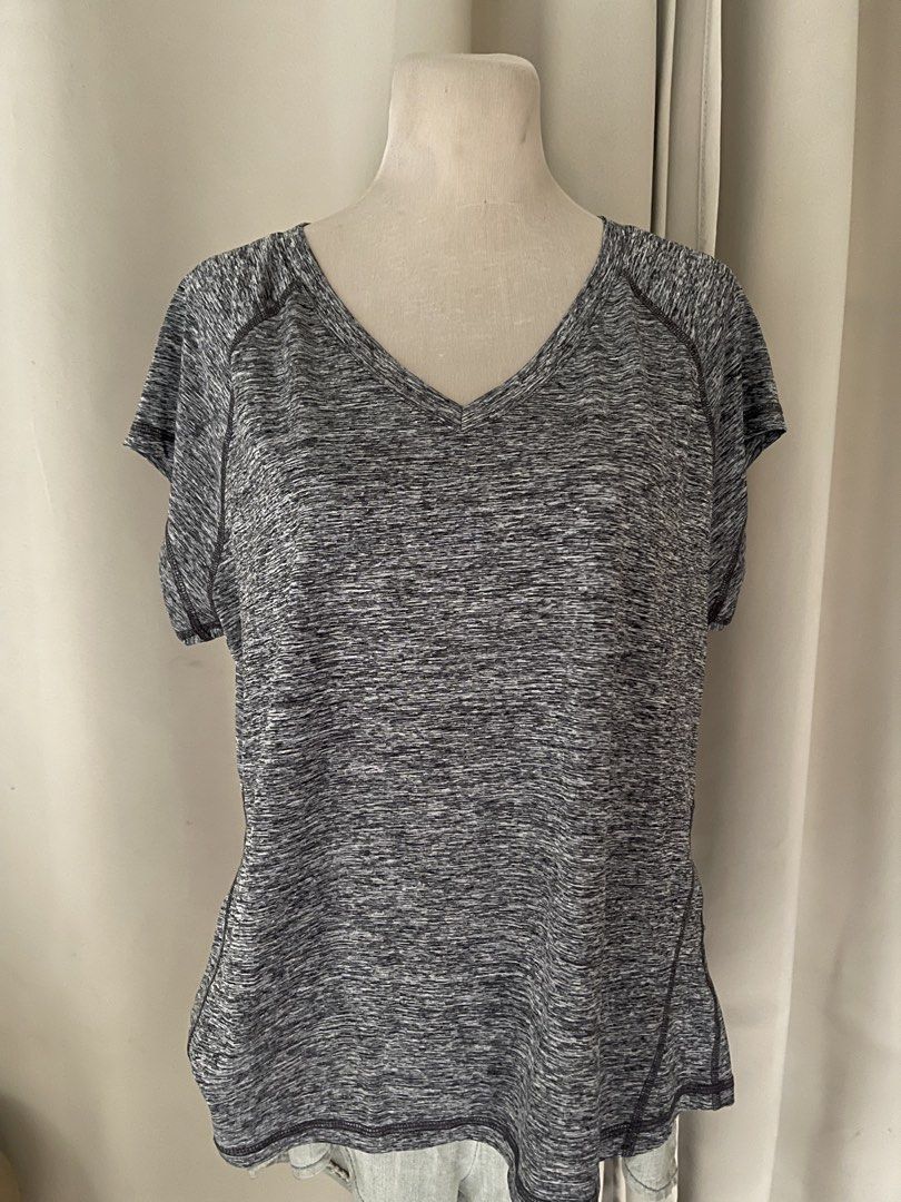 Athletic drifit womens (Category: Shirts) located in Cainta. Submitted by zlove111 (Listing ID 1470455218, Image 3). Description: - Grey marled short sleeve t-shirt - Flattering V-neck cut with contrast stitching on raglan sleeves - Lightweight, stretchy, and easy to move in - Curved hemline with a slightly longer back for extra coverage - Versatile for workouts, yoga, or daily errands large -xl 22".