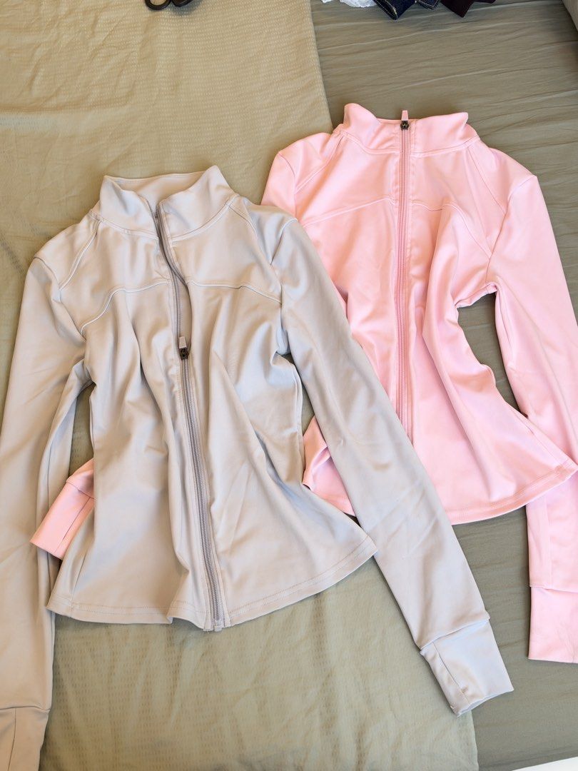 Athletic Zip Jacket with Thumbholes Pink and Grey Bundle (Category: Coats, Jackets and Outerwear) located in Makati City. Submitted by itsmeann09 (Listing ID 1470393513, Image 2). Description: - Set of 2: Pastel Pink & Soft Grey - Features: Long sleeves with thumbhole cuffs & high collars - Fabric: Smooth, ultra-stretchy, and breathable - Ideal for: Gym workouts, running, or casual everyday wear - Condition: Brand new / Excellent quality.