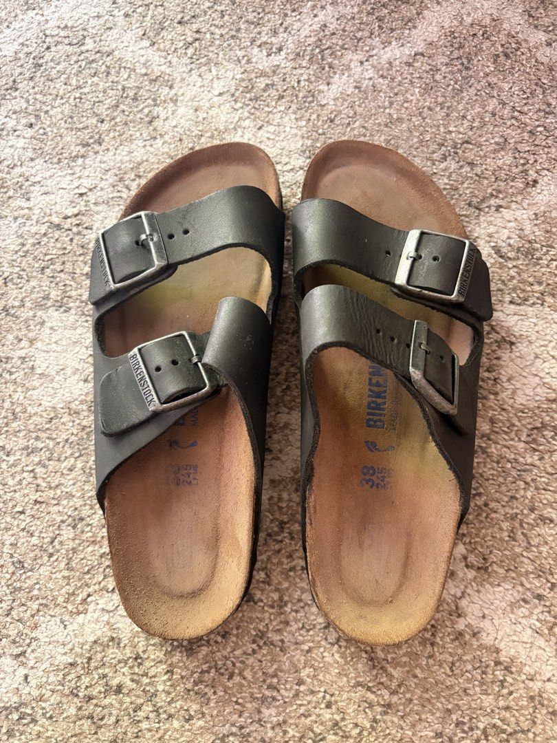 Auth Preloved Birkenstock Arizona (Category: Slippers and slides) located in Paranaque City. Submitted by silentstone.dolphin (Listing ID 1470356690, Image 2). Description: Oiled Leather Material.. Color Black/Charcoal Brass Buckle.. Soft Footbed.. Visible Print.. Size 38N.. Super Nice in Actual😍 .
