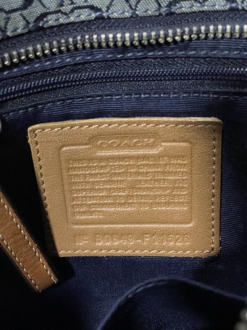 Authentic Coach Signature Tote and Hobo Bag Bundle (Category: Luxury Bags & Wallets) located in Calapan. Submitted by lucasthrifts (Listing ID 1470492949, Image 3). Description: - Authentic Coach 2-Bag Bundle - Bag 1: blue signature denim tote with tan leather trim, dual straps, buckle accents, and leather hangtag - Bag 2: Small white and cream signature C canvas hobo shoulder bag with stylish chain strap detail - Condition: Normal signs of previ