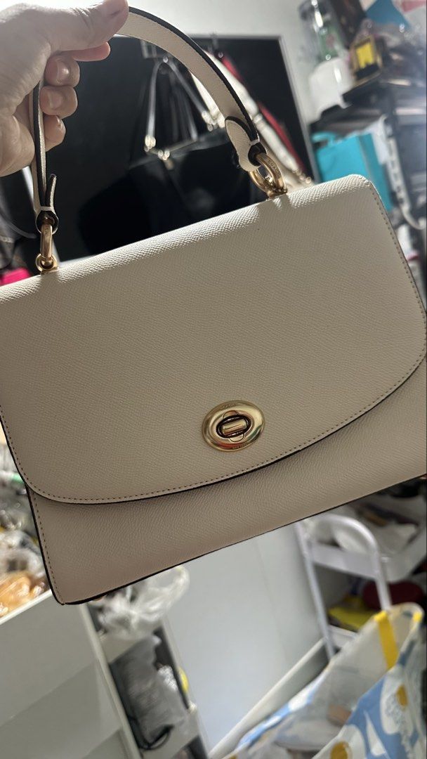 Authentic coach tilly top handle satchel (Category: Luxury Bags & Wallets) located in Caloocan City. Submitted by trebdy01 (Listing ID 1470388756, Image 1). Description: 👜 NWT Coach Tilly Top Handle Satchel Crossbody in Chalk / Gold Original MSRP: $398 Asking Price: $165 (Or Best Offer) Description: Elevate your everyday style with this absolutely gorgeous, 100% authentic Coach Tilly Top Handle Satchel (Style F76618). Featuring a pristine chalk 