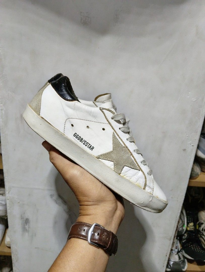 Authentic Golden goose size 38 (Category: Sneakers & Footwear) located in Cagayan de Oro. Submitted by warmbird-f84aab (Listing ID 1470552720, Image 1). Description: Classic GGDB Superstar in iconic white/ice suede star + black heel tab 🖤 ✅ Authentic pre-loved condition, natural vintage distressing (part of the design!) ✅ Size EU 38 | Genuine leather | Made in Italy 🇮🇹 ✅ no major damage—just normal wear ✅ Super comfy & timeless, goes with ever