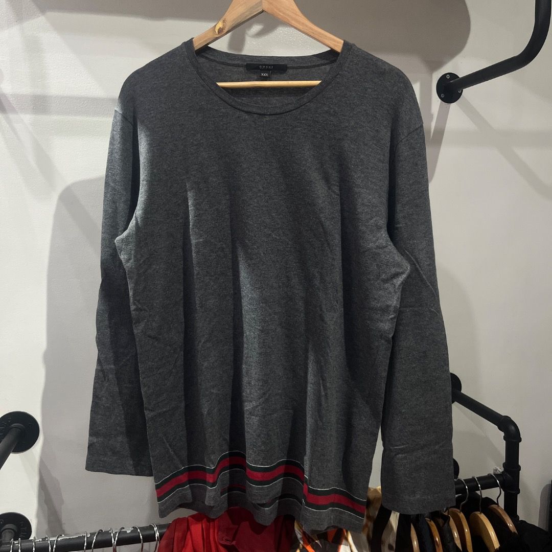 Authentic Gucci Tom Ford Sweater (Category: Luxury Apparel) located in Caloocan City. Submitted by achilles_grails (Listing ID 1470378287, Image 1). Description: - Brand: Authentic Gucci - Color: Dark Gray - Size: XXL - Material: 100% Cotton (Cotone/Coton/Baumwolle/Algodon) - Origin: Made in Italy - Condition: Excellent pre-owned condition - Features: Comfortable crew neck knitwear, premium designer quality.