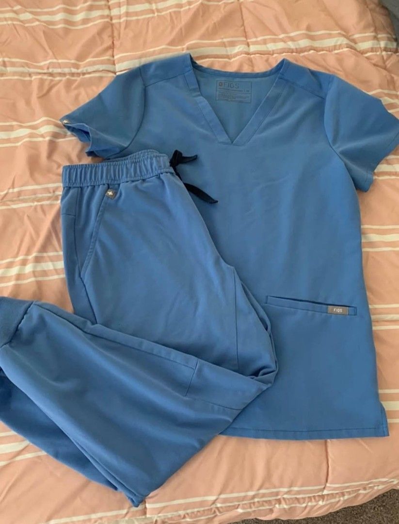 Authentic Like-New FIGS Scrub Set (Category: Activewear) located in San Juan. Submitted by docpratty (Listing ID 1470512167, Image 1). Description: Authentic like-new FIGS scrub set in Capri Blue. Casma Three-Pocket Scrub Top, size XS, and Jogger Scrub Pants, size S Short..