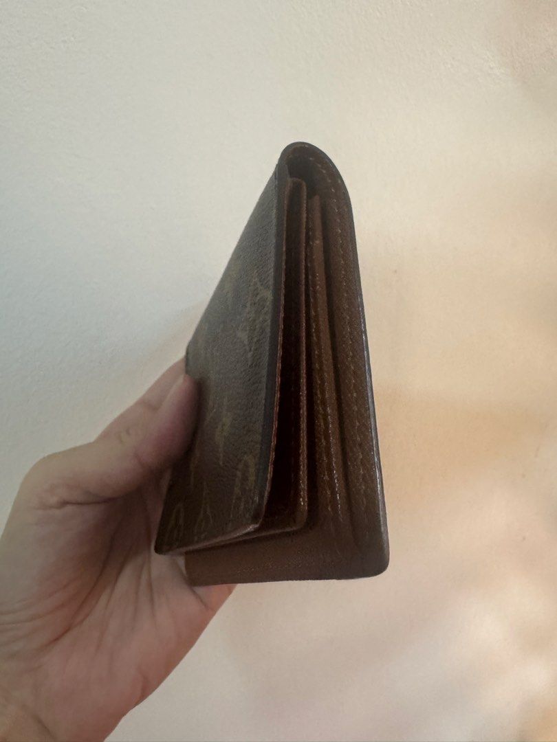 Authentic Louis Vuitton Compact Wallet (Category: Luxury Bags & Wallets) located in Angeles City. Submitted by thala.1204.68 (Listing ID 1470365397, Image 2). Description: - Authentic Louis Vuitton brown leather card wallet/100% authentic/ comes with cerbal authentication from B101 Revue and can add 5usd if you want a certificate - Clear ID window slot on the upper flap for quick access - Multiple card slots inside for your essentials - Stamped w