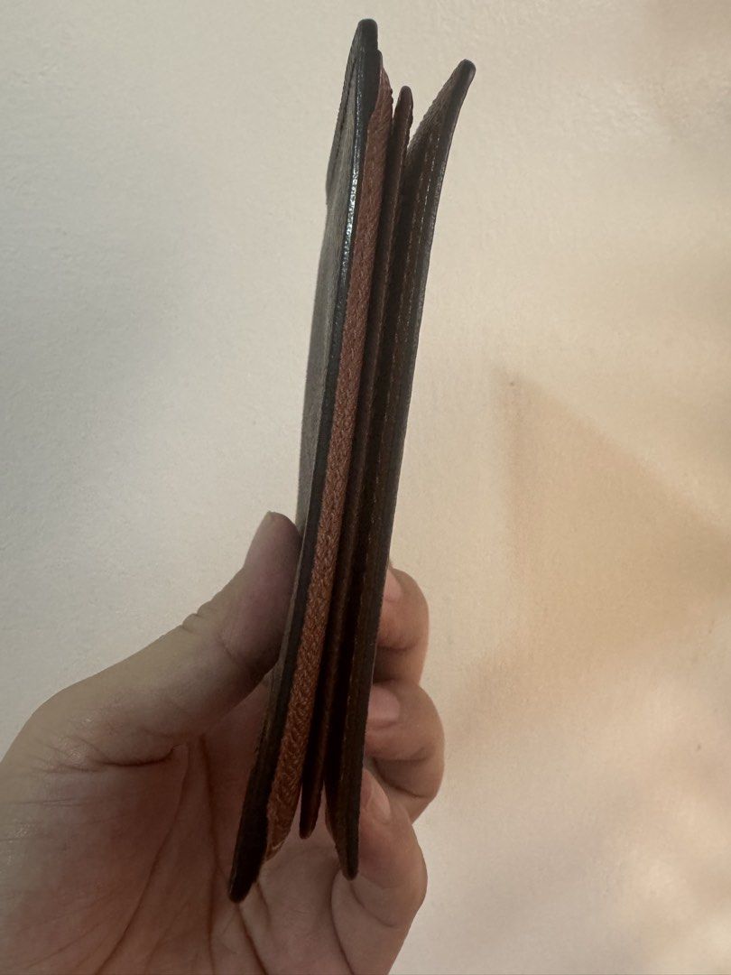 Authentic Louis Vuitton Compact Wallet (Category: Luxury Bags & Wallets) located in Angeles City. Submitted by thala.1204.68 (Listing ID 1470365397, Image 3). Description: - Authentic Louis Vuitton brown leather card wallet/100% authentic/ comes with cerbal authentication from B101 Revue and can add 5usd if you want a certificate - Clear ID window slot on the upper flap for quick access - Multiple card slots inside for your essentials - Stamped w