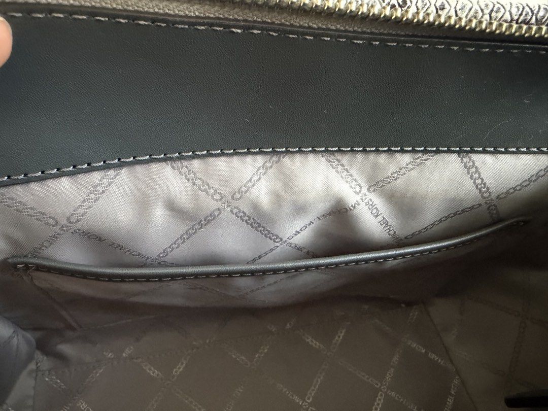 Authentic Michael Kors Marilyn Satchel (Category: Luxury Bags & Wallets) located in Makati City. Submitted by fashio-anne (Listing ID 1470406923, Image 3). Description: Bought from Macy’s in Los Angeles, USA last year Comes with its original care card original box and dust bag not available • 100% leather from tanneries meeting the highest standards of environmental performance • Satchel • Snake embossed leather • 100% leather • Silver-tone hardw