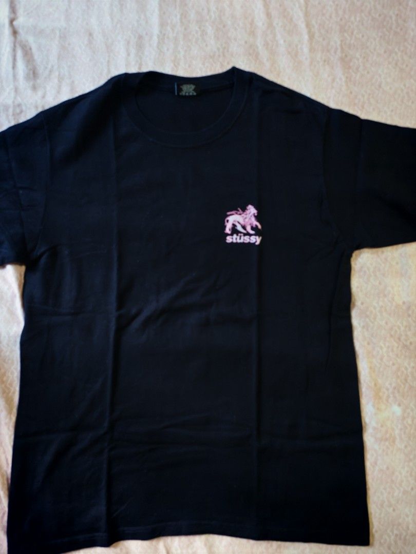 Authentic Stüssy Rasta Lion Tee (Category: Tshirts & Polo Shirts ) located in Mandaluyong City. Submitted by fiercestorm.31 (Listing ID 1470423384, Image 1). Description: AUTHENTIC Stüssy Rasta Lion Tee excellent condition Dm for more photos.