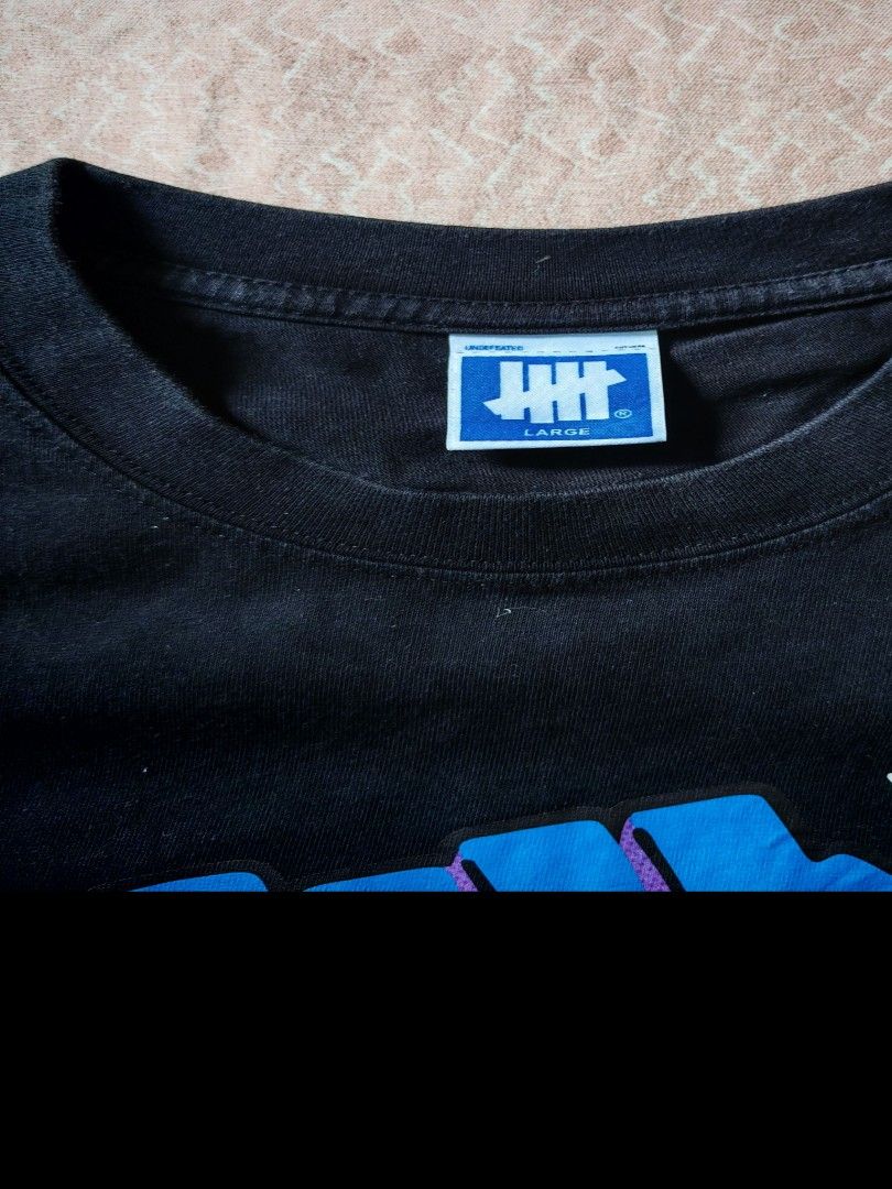 Authentic Undefeated shirt (Category: Tshirts & Polo Shirts ) located in Mandaluyong City. Submitted by fiercestorm.31 (Listing ID 1470421114, Image 3). Description: Authentic Undefeated t-shirt Used twice only Dm for more photos.