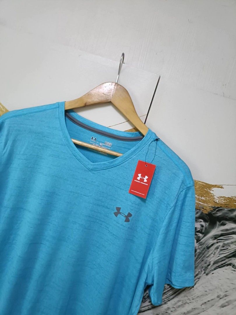 AUTHENTIC Under Armour Men's Tech (Category: Activewear) located in Magalang. Submitted by itskate_cc (Listing ID 1470460720, Image 3). Description: AUTHENTIC Under Armour Men's Tech inches Armpit to Armpit/Widht 24 Lenght/ 27 fittings is XL Excellent Condition, Issue: Message if you have any other question about sizing. We do shipping nation wide I'm also A A open for video call so that you can see the item you 're interested to buy. Courier, DH