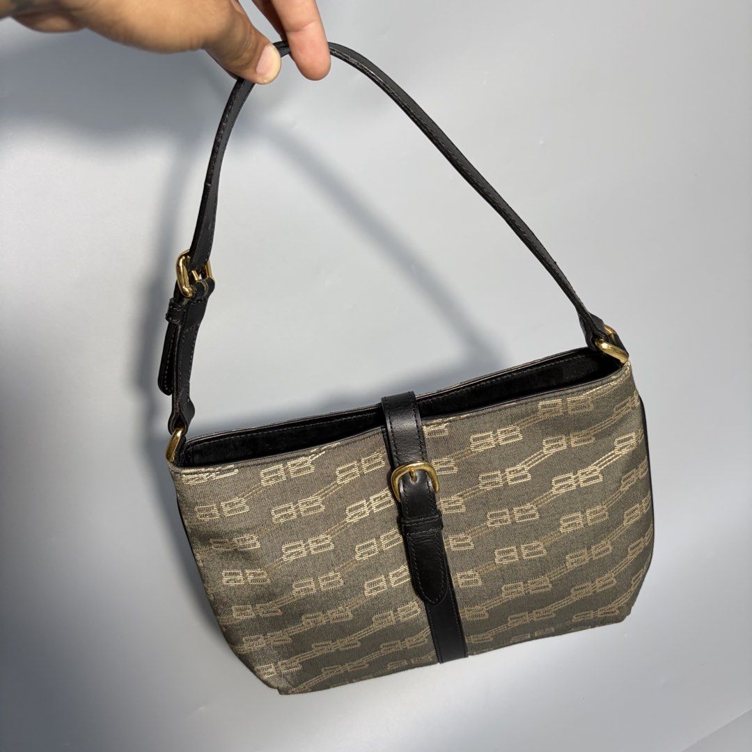 Authentic vintage Balenciaga shoulder bag , black, all-over logo pattern (Category: Luxury Bags & Wallets) located in Magalang. Submitted by luxgood18 (Listing ID 1470453036, Image 1). Description: vintage Balenciaga BB Monogram Canvas Shoulder Bag dating back to the late 1990s or early 2000s (Y2K era) Rank A Guaranteed authentic.