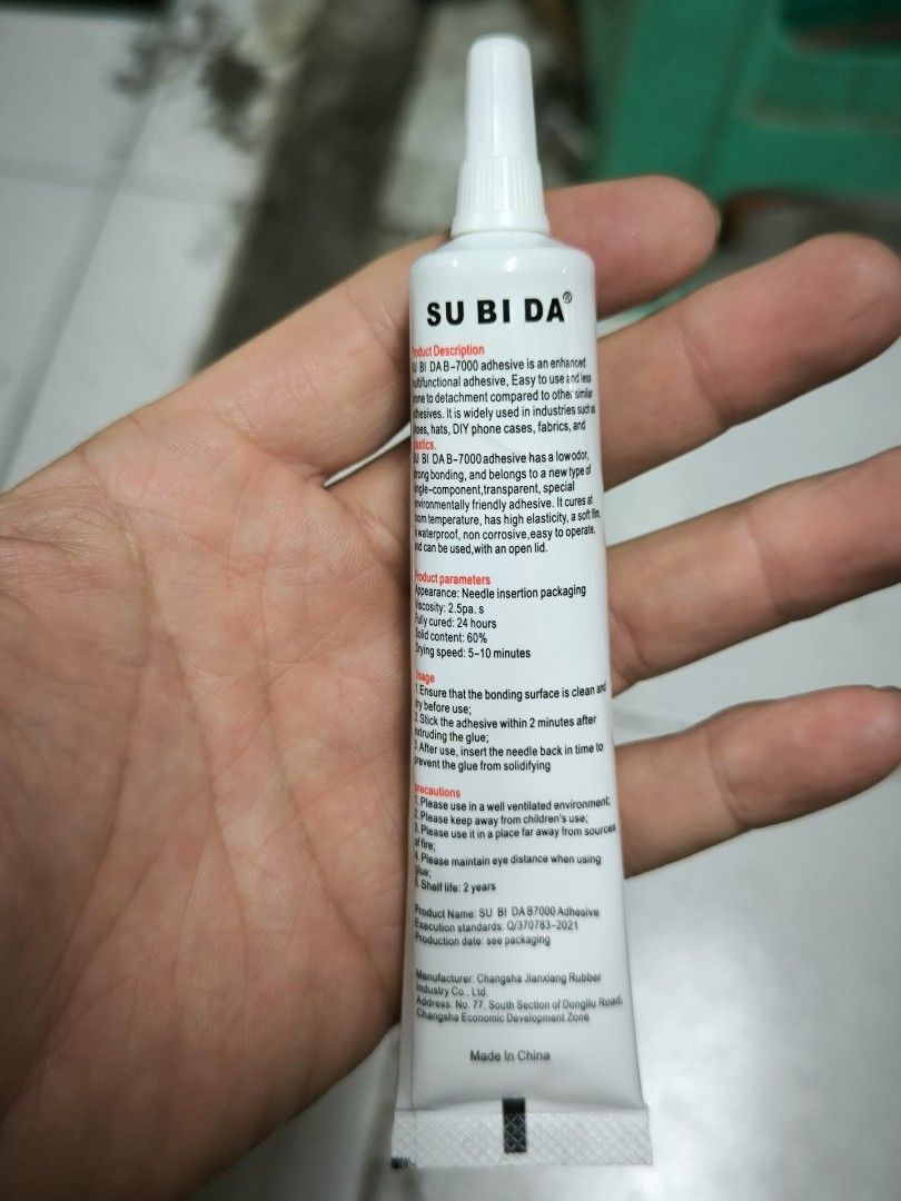 B-7000 Multi-Purpose Adhesive 50ml (Category: Craft Supplies & Tools) located in Angeles City. Submitted by yellowbrickstore (Listing ID 1470427063, Image 2). Description: Multi-Purpose Clear Glue in a 50ml (1.68 fl. oz) tube. Features a precision needle applicator cap that prevents clogging and drying. Ideal for phone frame repair, screen bonding, DIY jewelry, shoe repair, plastics, leather, and general crafts..