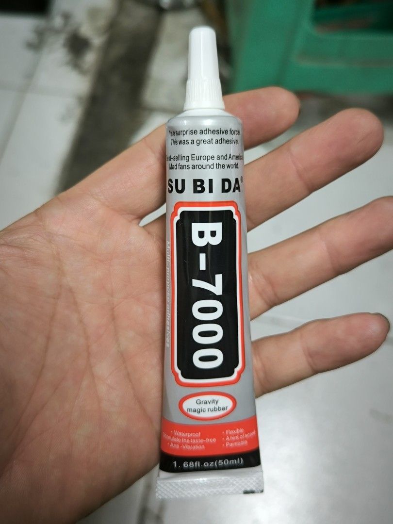 B-7000 Multi-Purpose Adhesive 50ml (Category: Craft Supplies & Tools) located in Angeles City. Submitted by yellowbrickstore (Listing ID 1470427063, Image 1). Description: Multi-Purpose Clear Glue in a 50ml (1.68 fl. oz) tube. Features a precision needle applicator cap that prevents clogging and drying. Ideal for phone frame repair, screen bonding, DIY jewelry, shoe repair, plastics, leather, and general crafts..