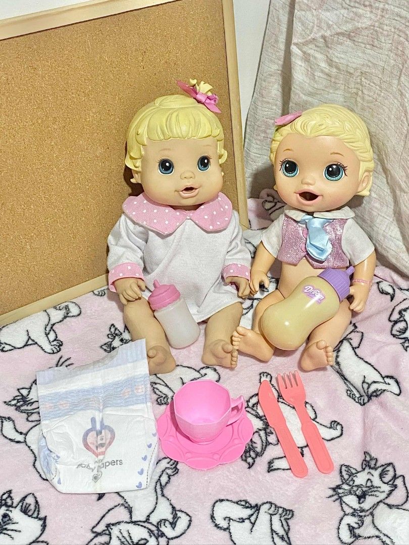 Baby Alive Hasbro Dolls Bundle (Category: Kids Toys) located in Quezon City. Submitted by _dkswpffk (Listing ID 1470469002, Image 2). Description: ୨୧ baby alive hasbro dolls bundle! ♡ includes 2 authentic hasbro baby alive dolls: 𐙚 2008 better now baby 𐙚 2015 snackin' lily ♡ comes with some accessories too! ♡ both dolls are preloved, so please manage your expectations. wysiwyg. mop: gcash / COD via lalamove mod: j&t / lalamove location: novalic