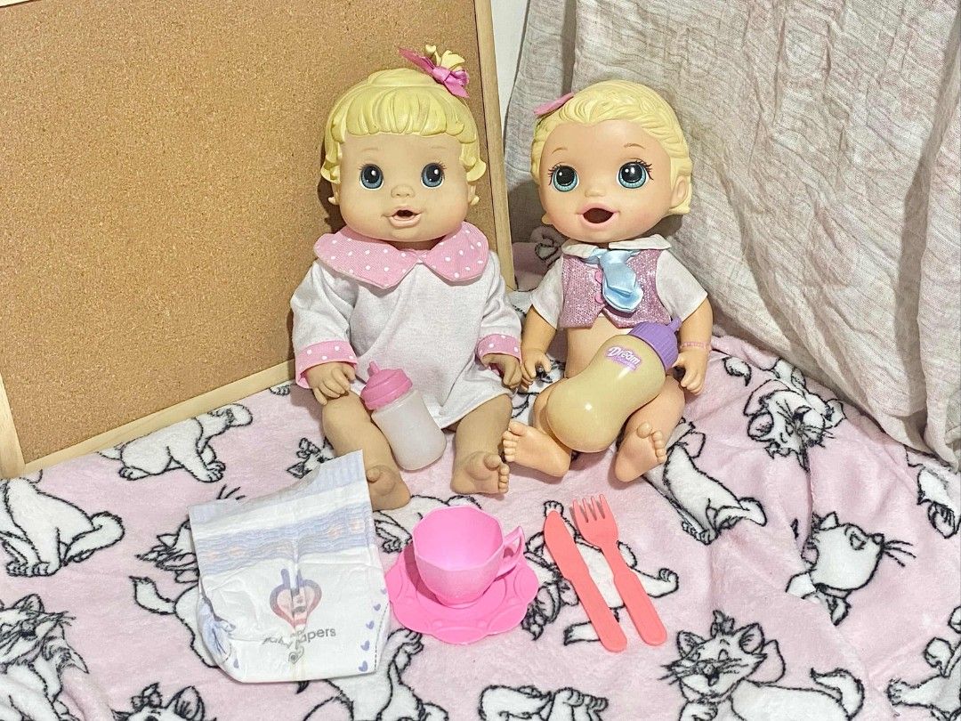 Baby Alive Hasbro Dolls Bundle (Category: Kids Toys) located in Quezon City. Submitted by _dkswpffk (Listing ID 1470469002, Image 1). Description: ୨୧ baby alive hasbro dolls bundle! ♡ includes 2 authentic hasbro baby alive dolls: 𐙚 2008 better now baby 𐙚 2015 snackin' lily ♡ comes with some accessories too! ♡ both dolls are preloved, so please manage your expectations. wysiwyg. mop: gcash / COD via lalamove mod: j&t / lalamove location: novalic