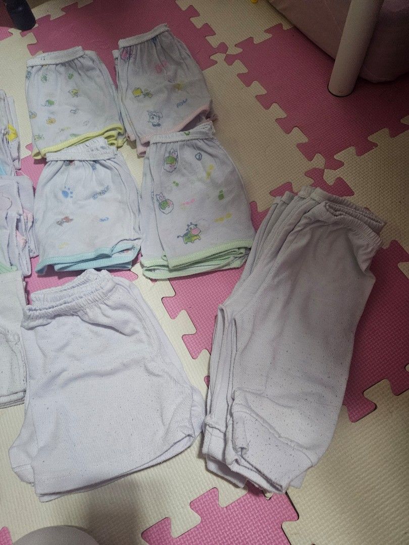Baby clothes sando short pajama bundle 39 pcs (Category: Babies & Kids Fashion) located in Manila. Submitted by danayamiracle (Listing ID 1470501360, Image 3). Description: - Bundle includes soft cotton shorts and singlet tops - Features various cute pastel prints and colors - Made with breathable, comfortable fabric ideal for daily wear - Great quality essential basics for infants - Neatly folded and ready for your little one well used. labhan n