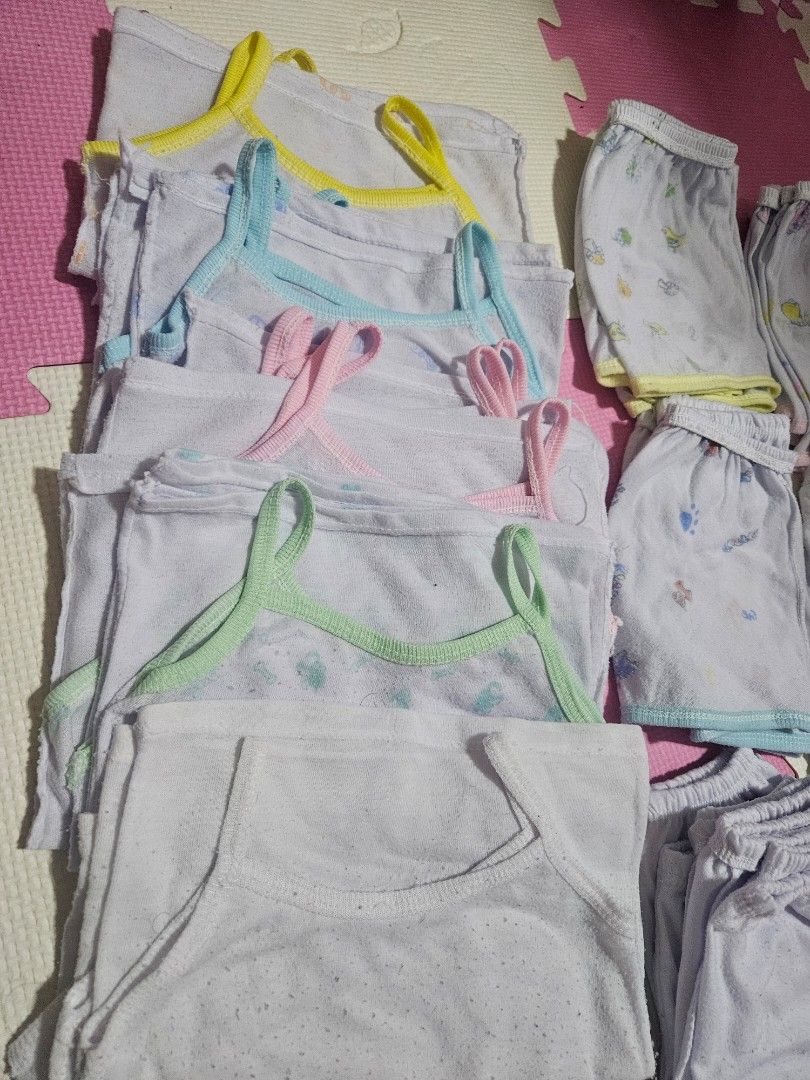 Baby clothes sando short pajama bundle 39 pcs (Category: Babies & Kids Fashion) located in Manila. Submitted by danayamiracle (Listing ID 1470501360, Image 1). Description: - Bundle includes soft cotton shorts and singlet tops - Features various cute pastel prints and colors - Made with breathable, comfortable fabric ideal for daily wear - Great quality essential basics for infants - Neatly folded and ready for your little one well used. labhan n
